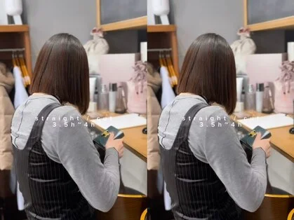 毛先までまっすぐ整った艶のあるストレートヘアの女性